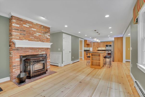 Fireplace, Interior, Kitchen, Pendant Lights, Recessed Lighting, Stone Walls, Wood Texture Flooring