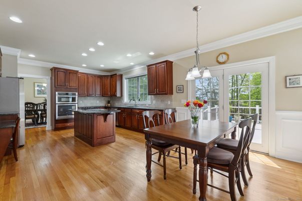 Dining room, Interior, Kitchen, Pendant Lights, Recessed Lighting, Stainless Steel Appliances, Wood Texture Flooring