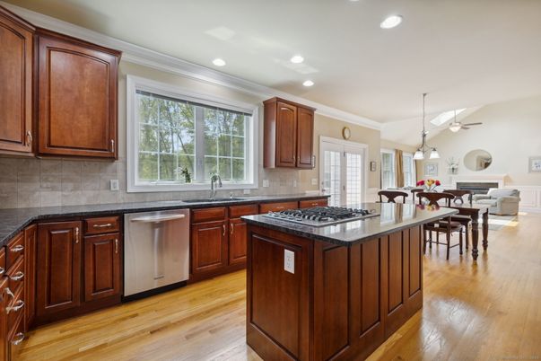 Dining room, Interior, Kitchen, Pendant Lights, Recessed Lighting, Stainless Steel Appliances, Wood Texture Flooring