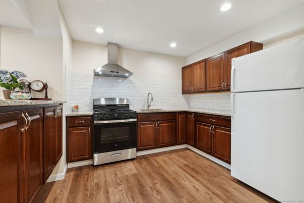 Interior, Kitchen, Recessed Lighting, Stainless Steel Appliances, Wood Texture Flooring