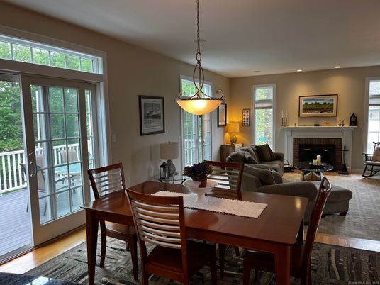 Dining room, Fireplace, Interior, Living room, Pendant Lights, Recessed Lighting, Wood Texture Flooring