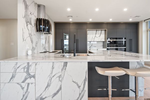 Interior, Kitchen, Marble Walls, Recessed Lighting, Stainless Steel Appliances