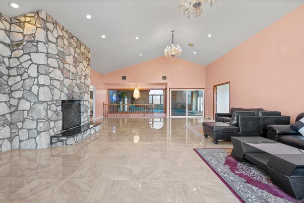 Chandelier, Fireplace, Interior, Living room, Recessed Lighting, Stone Walls