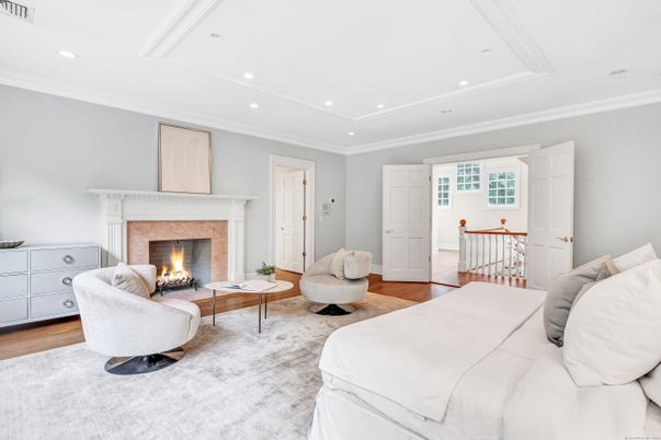 Bedroom, Fireplace, Interior, Living room, Recessed Lighting, Wood Texture Flooring