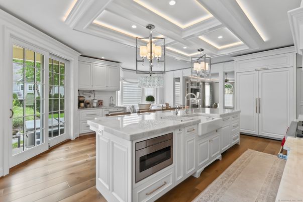 Chandelier, Interior, Kitchen, Pendant Lights, Recessed Lighting, Stainless Steel Appliances, Wood Texture Flooring