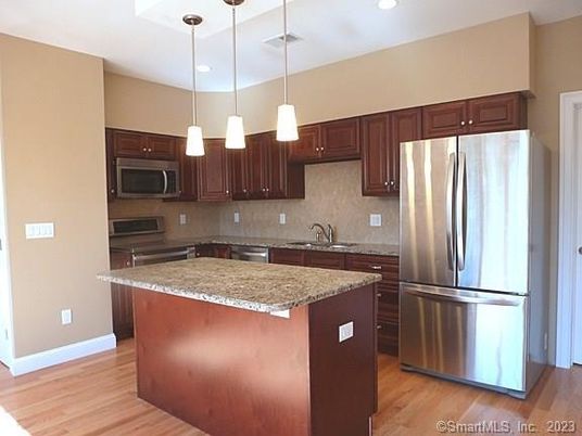 Interior, Kitchen, Pendant Lights, Recessed Lighting, Stainless Steel Appliances, Wood Texture Flooring