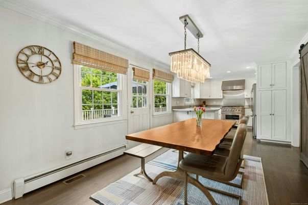 Chandelier, Dining room, Interior, Kitchen, Recessed Lighting, Stainless Steel Appliances, Wood Texture Flooring