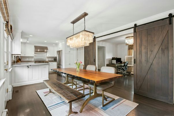 Chandelier, Dining room, Interior, Kitchen, Recessed Lighting, Stainless Steel Appliances, Wood Texture Flooring