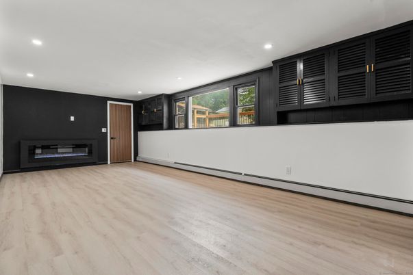 Empty room, Fireplace, Interior, Recessed Lighting, Wood Texture Flooring