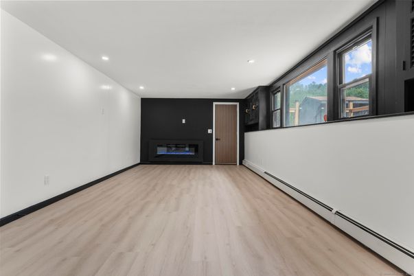 Empty room, Fireplace, Interior, Recessed Lighting, Wood Texture Flooring