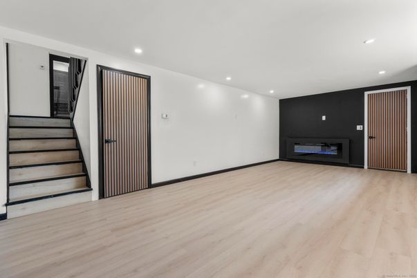 Empty room, Fireplace, Interior, Recessed Lighting, Wood Texture Flooring