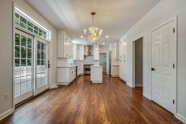 Chandelier, Interior, Kitchen, Recessed Lighting, Stainless Steel Appliances, Wood Texture Flooring