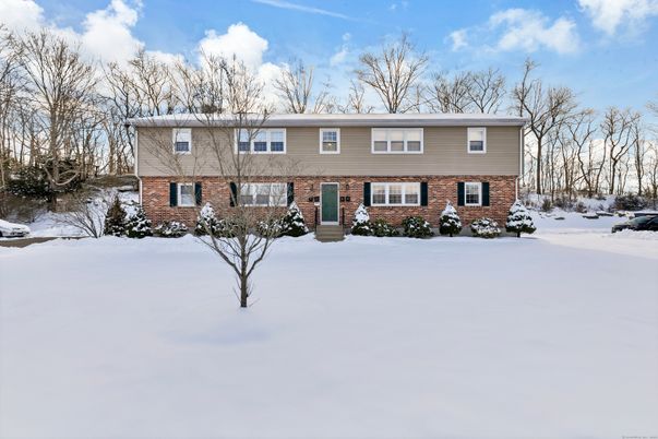 Exterior, Facade, Brick Facade, Raised Ranch