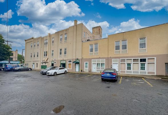 Attached, Exterior, Facade, Condo Building