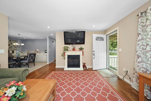 Chandelier, Dining room, Fireplace, Interior, Recessed Lighting, Wood Texture Flooring