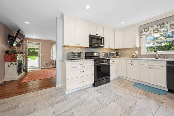 Interior, Kitchen, Marble, Recessed Lighting, Stainless Steel Appliances, Wood Texture Flooring