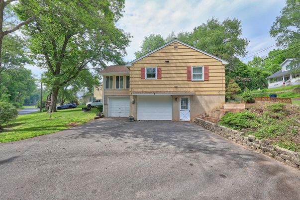 Attached, Exterior, Facade, Raised Ranch