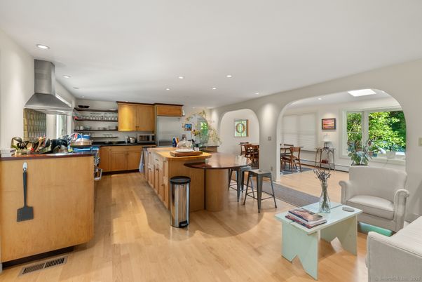 Dining room, Interior, Kitchen, Recessed Lighting, Stainless Steel Appliances, Wood Texture Flooring