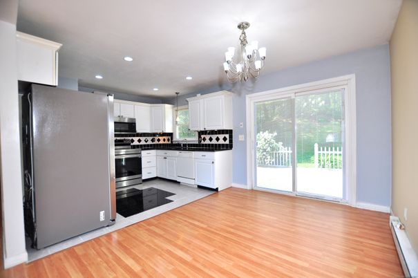 Chandelier, Interior, Kitchen, Recessed Lighting, Stainless Steel Appliances, Wood Texture Flooring