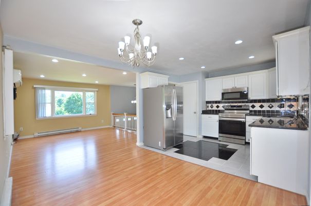 Chandelier, Interior, Kitchen, Recessed Lighting, Stainless Steel Appliances, Wood Texture Flooring