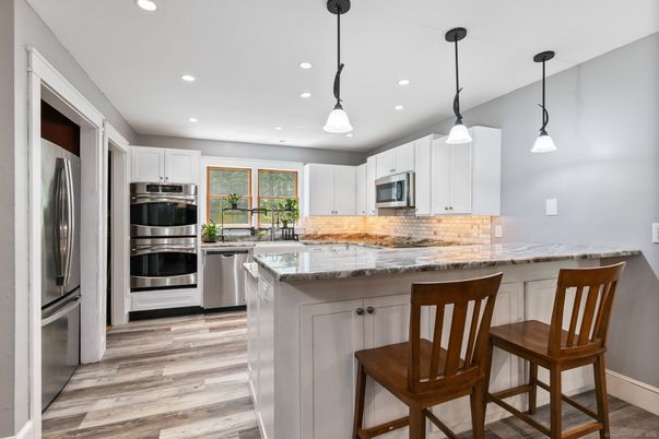 Interior, Kitchen, Pendant Lights, Recessed Lighting, Stainless Steel Appliances, Wood Texture Flooring