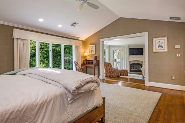 Bedroom, Fireplace, Interior, Recessed Lighting, Wood Texture Flooring