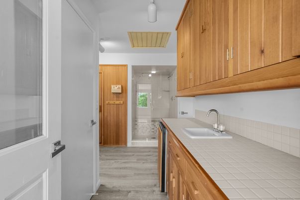Bathroom, Glass Shower, Interior, Tile Countertops, Wood Texture Flooring