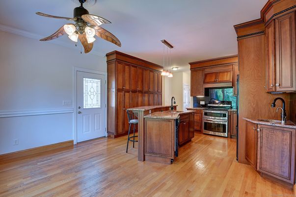 Interior, Kitchen, Pendant Lights, Stainless Steel Appliances, Wood Texture Flooring