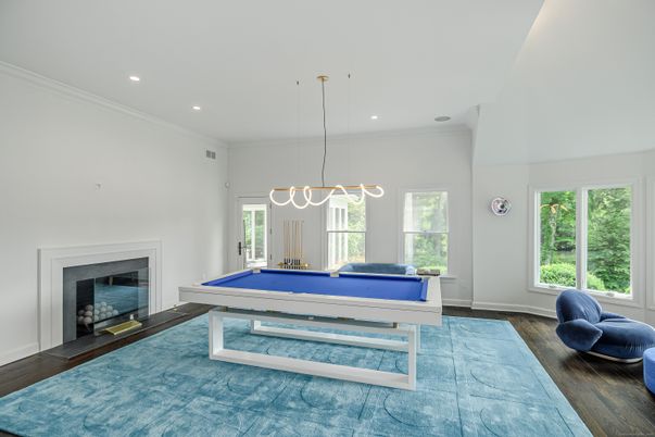 Billiard Table, Fireplace, Game Room, Interior, Pendant Lights, Recessed Lighting, Wood Texture Flooring