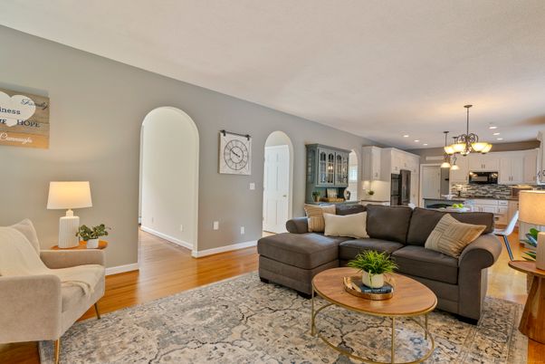 Chandelier, Interior, Kitchen, Living room, Pendant Lights, Recessed Lighting, Stainless Steel Appliances, Wood Texture Flooring