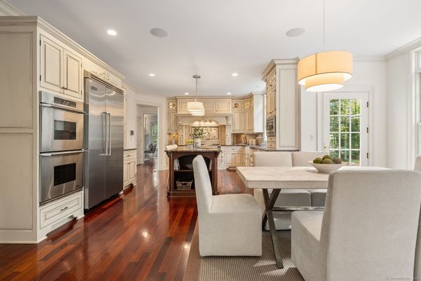 Dining room, Interior, Kitchen, Pendant Lights, Recessed Lighting, Stainless Steel Appliances, Wood Texture Flooring