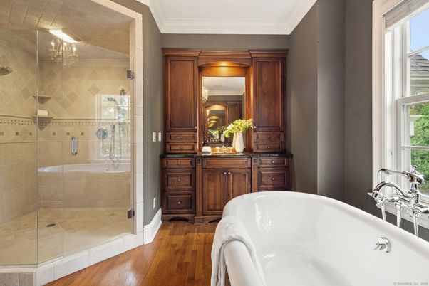 Bathroom, Free Standing Baths, Glass Shower, Interior, Recessed Lighting, Wood Texture Flooring