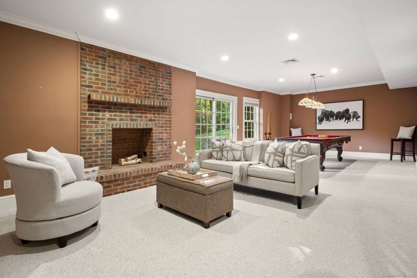 Billiard Table, Chandelier, Fireplace, Game Room, Interior, Living room, Pendant Lights, Recessed Lighting, Stone Walls