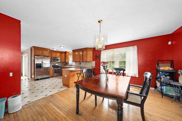 Chandelier, Dining room, Interior, Kitchen, Stainless Steel Appliances, Wood Texture Flooring