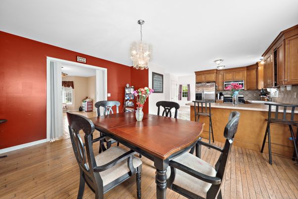 Chandelier, Dining room, Interior, Kitchen, Stainless Steel Appliances, Wood Texture Flooring