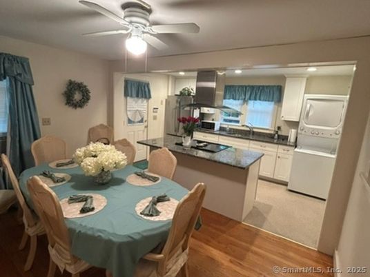 Dining room, Interior, Kitchen, Recessed Lighting, Stainless Steel Appliances, Wood Texture Flooring