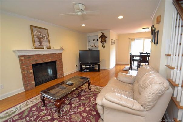 Dining room, Fireplace, Interior, Living room, Recessed Lighting, Wood Texture Flooring