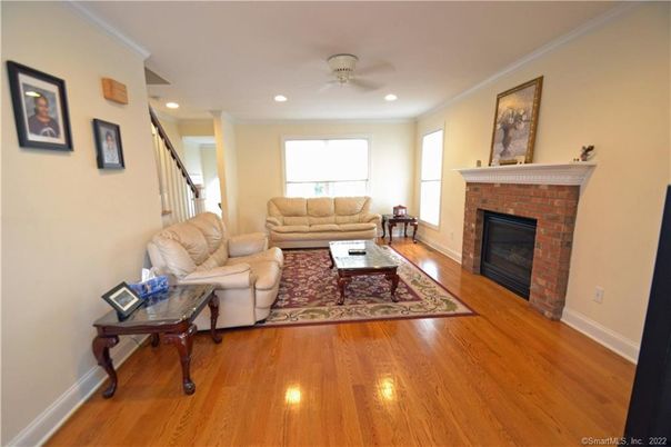Fireplace, Interior, Living room, Recessed Lighting, Wood Texture Flooring