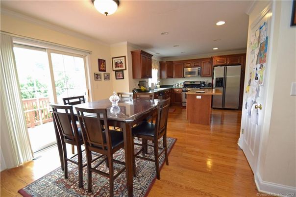 Dining room, Interior, Kitchen, Recessed Lighting, Stainless Steel Appliances, Wood Texture Flooring