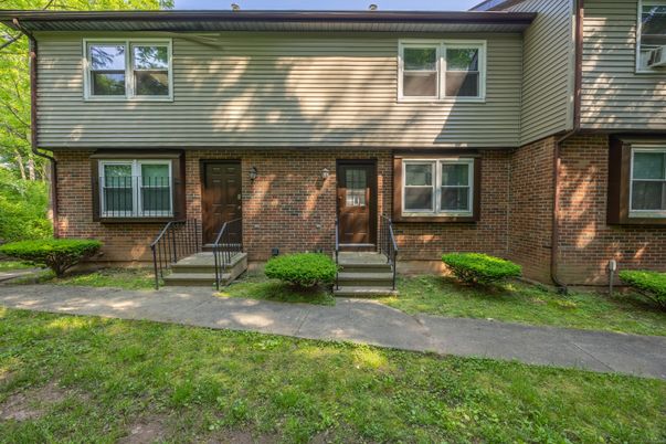 Exterior, Facade, Brick Facade, Raised Ranch