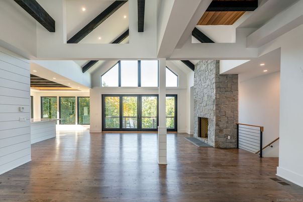 Empty room, Fireplace, Interior, Recessed Lighting, Wooden Beams, Wood Texture Flooring