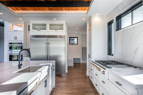 Interior, Kitchen, Marble Walls, Recessed Lighting, Stainless Steel Appliances, Wooden Ceilings, Wood Texture Flooring