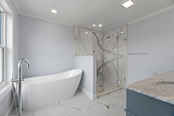 Bathroom, Free Standing Baths, Glass Shower, Interior, Marble, Marble Walls, Recessed Lighting
