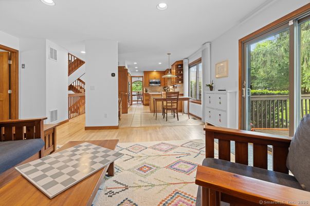 Dining room, Interior, Kitchen, Pendant Lights, Recessed Lighting, Stainless Steel Appliances, Wood Texture Flooring