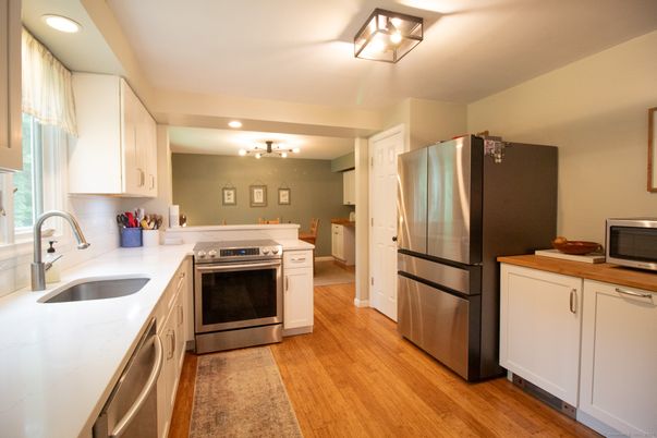Interior, Kitchen, Recessed Lighting, Stainless Steel Appliances, Wood Texture Flooring