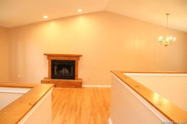 Chandelier, Fireplace, Interior, Recessed Lighting, Wood Texture Flooring