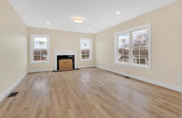 Empty room, Fireplace, Interior, Recessed Lighting, Wood Texture Flooring