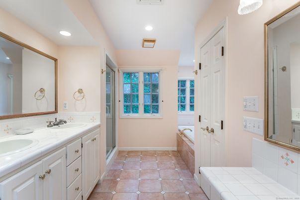 Bathroom, Dual Sink Vanities, Interior, Recessed Lighting, Tile Countertops