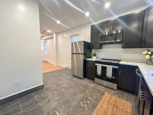 Interior, Kitchen, Recessed Lighting, Stainless Steel Appliances, Wood Texture Flooring