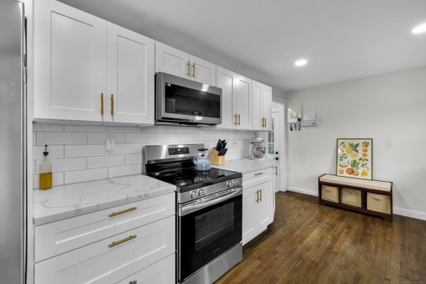 Interior, Kitchen, Recessed Lighting, Stainless Steel Appliances, Wood Texture Flooring